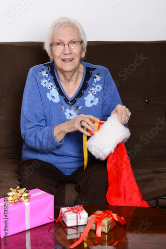 senior stuffing christmas stocking