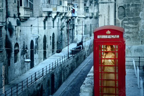 Alone in the phone box