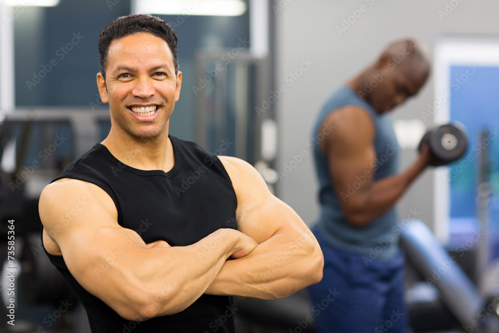 muscular man with arms crossed muscular man with arms crossed