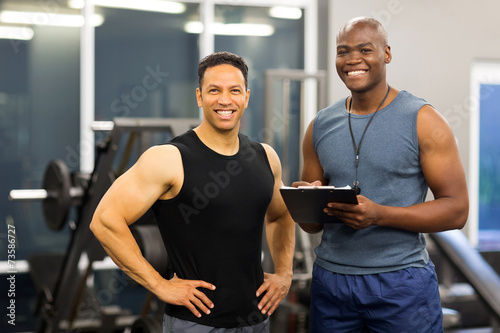 Photography african american fitness instructor with client