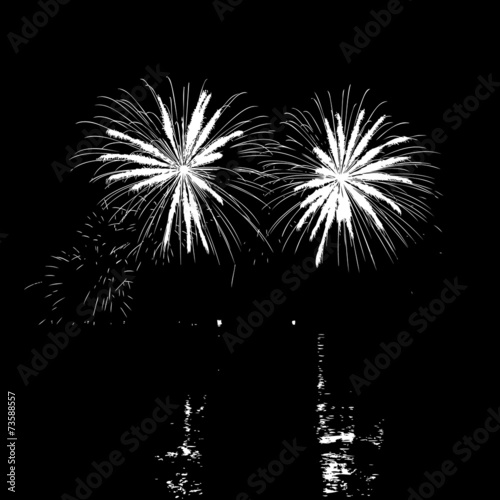 Fireworks with reflection on lake