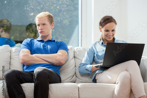 Bored man and happy woman