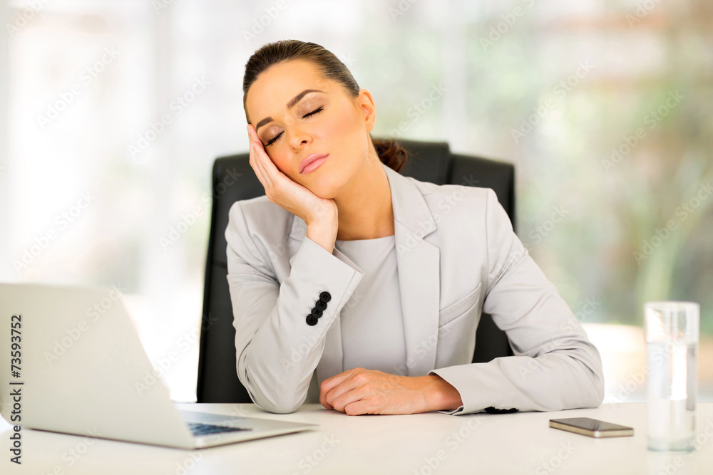 businesswoman sleeping in office businesswoman sleeping in office