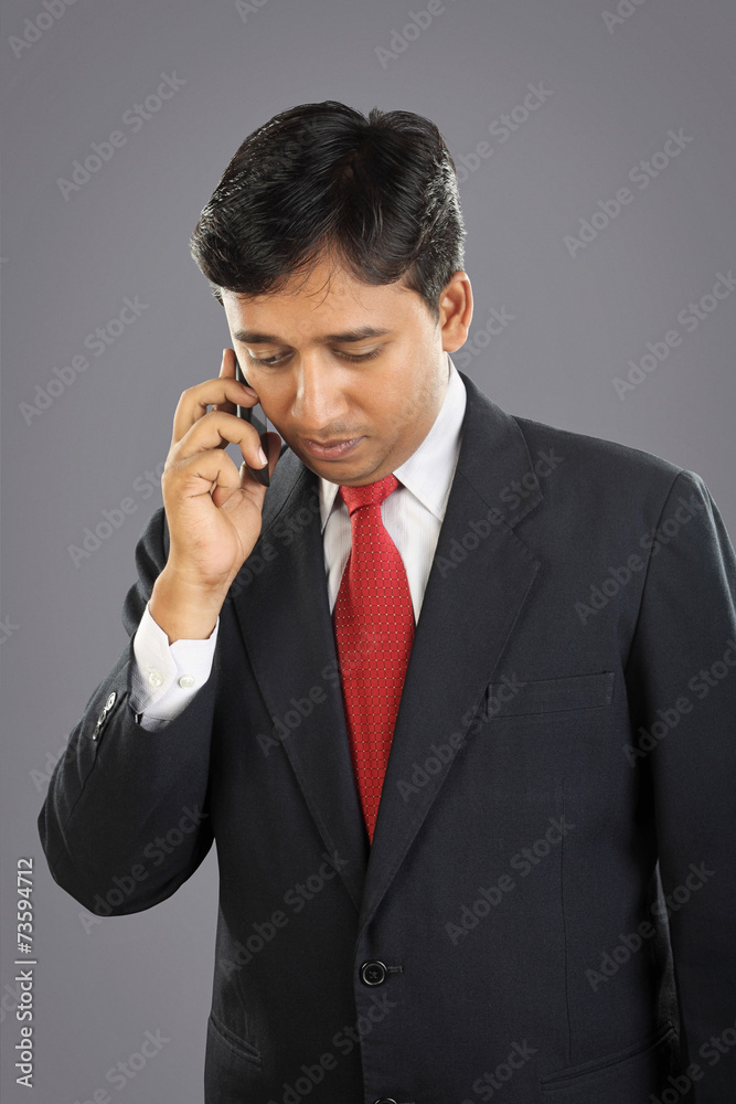 Indian Businessman with Cellphone Indian Businessman with Cellphone