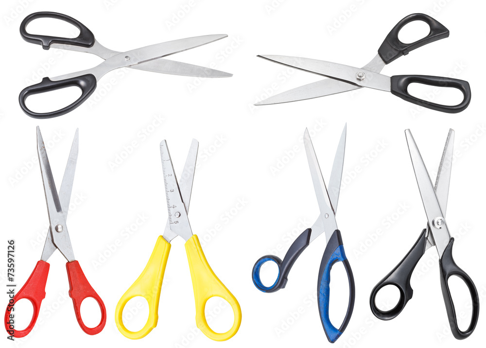 set of different open scissors isolated on white
