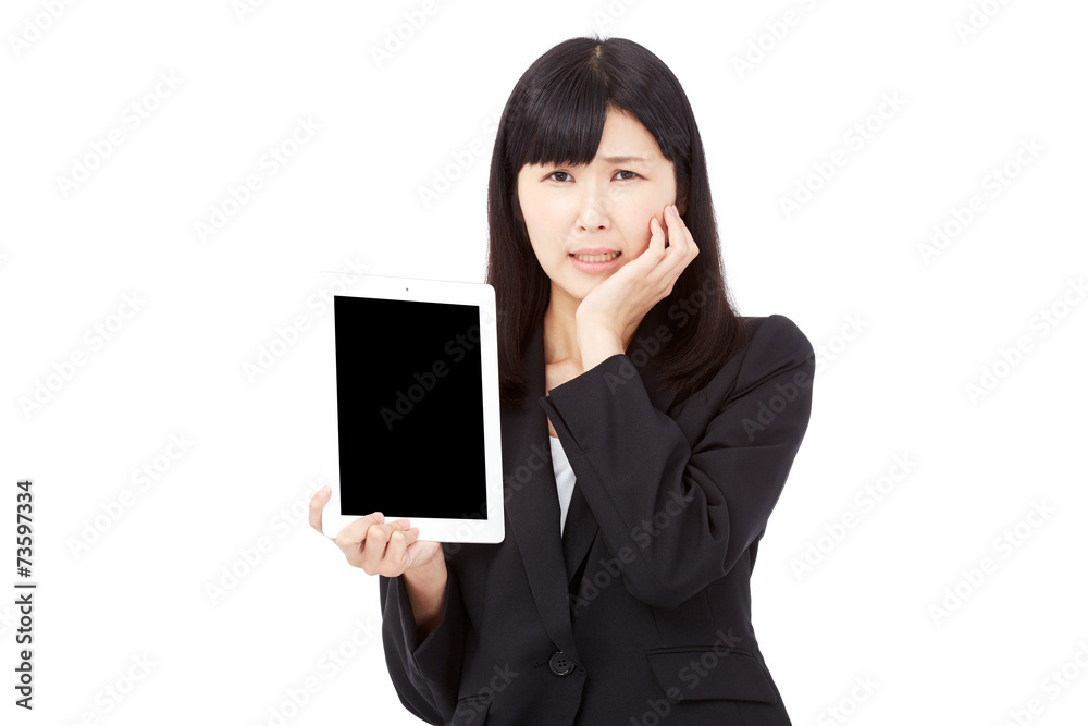 タブレットを見せて困るビジネスウーマン タブレットを見せて困るビジネスウーマン