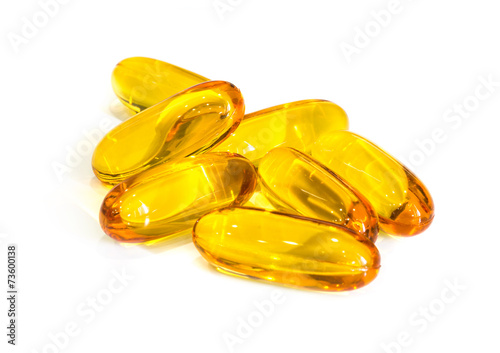 Fish oil supplement capsules isolated on white background