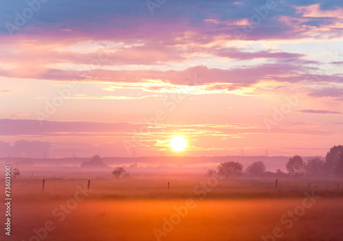 Fototapeta Naklejka Na Ścianę i Meble -  Grass Land Burning Sunset