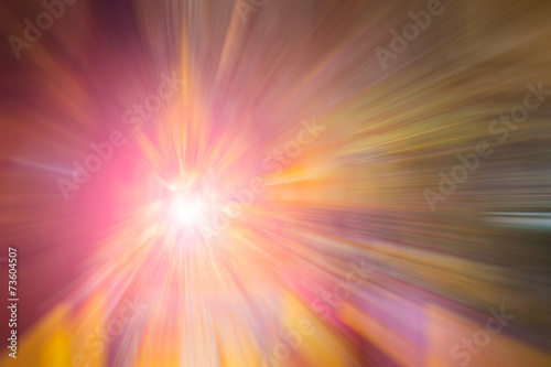 flare and red and yellow color radial motion blur abstract of bu