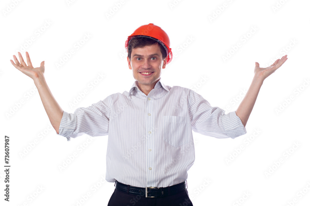 Man in a shirt orange construction helmet, throws up his hands Man in a shirt orange construction helmet, throws up his hands