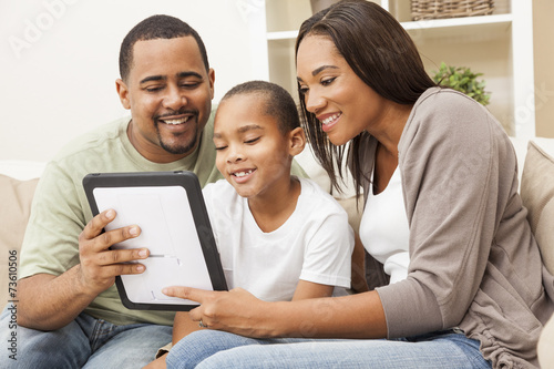 African American Family Using Tablet Computer