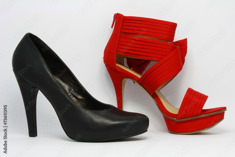 Two high-heeled shoes. Two high-heeled shoes.