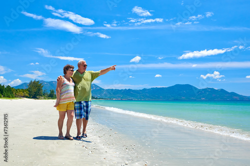 Photography Romantic Senior Couple Walking On Beautiful Tropical Beach.