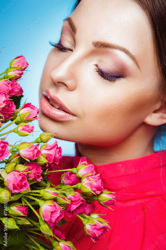 Portrait of Beautiful Young Woman with Flowers. Healthy Skin Portrait of Beautiful Young Woman with Flowers. Healthy Skin