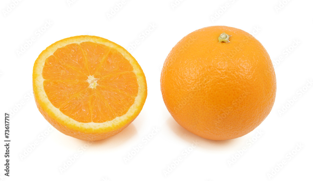 Whole orange and half fruit showing cross section Whole orange and half fruit showing cross section