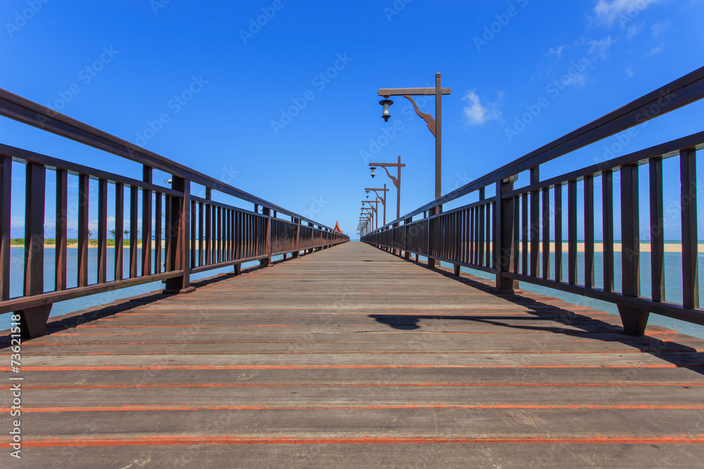 Wood bridge to the sea