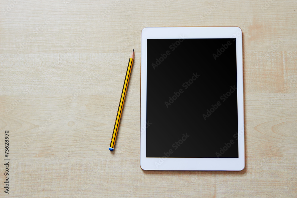 White tablet pc with a blank screen and space for text White tablet pc with a blank screen and space for text