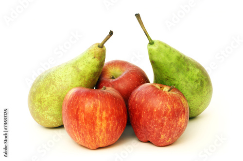 A lot of pears and apples isolated on white