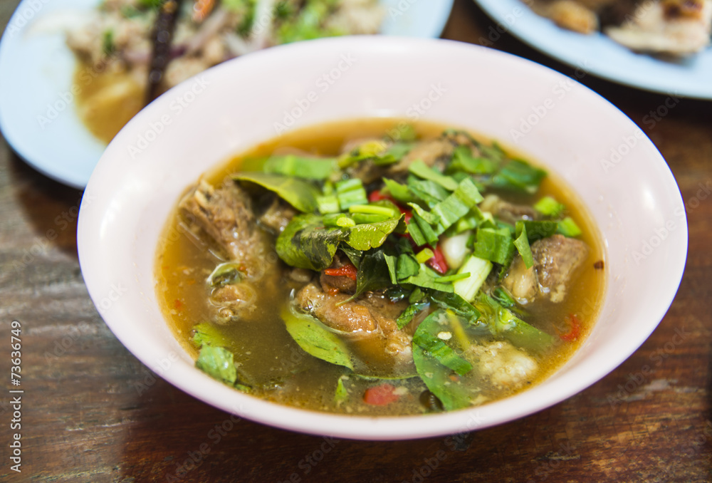 Spicy soup with pork ribs in Thai Style Spicy soup with pork ribs in Thai Style