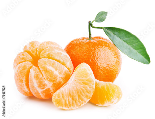tangerines with leaves on white background photo