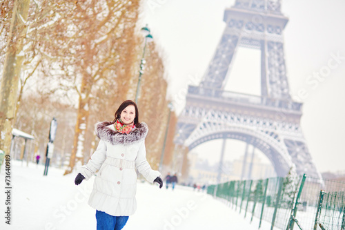 Girl enjoying rare snowy winter day in Paris © Ekaterina Pokrovsky