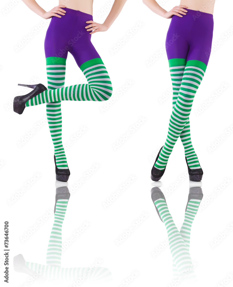 Woman legs isolated on the white background Woman legs isolated on the white background
