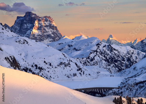 Winter landscape of high snowy mountains photo