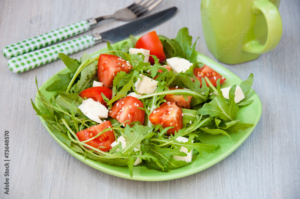 Greece salad with mozzarella, ruccola and tomatoes Greece salad with mozzarella, ruccola and tomatoes