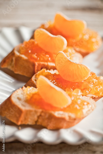 pieces of baguette with orange marmalade