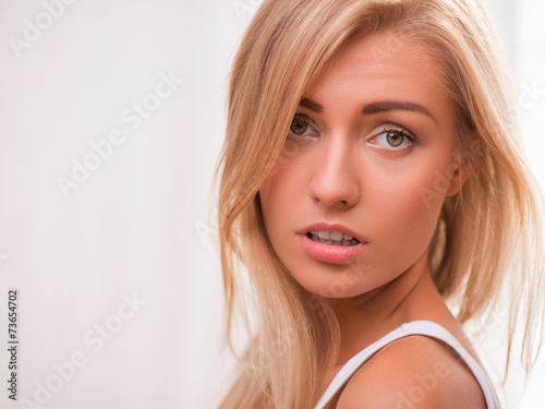 Beautiful blond girl expresses different emotions