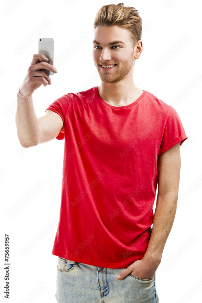 Young man taking a selfie Young man taking a selfie