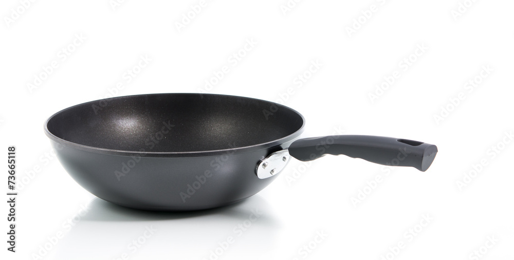Closeup black frying pan isolated Closeup black frying pan isolated