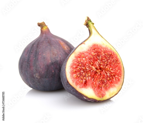 Two sliced figs isolated on white background