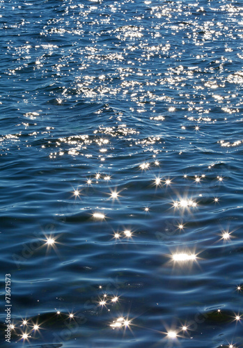 Foto Baikal. Sun spots are on the waves. Natural background