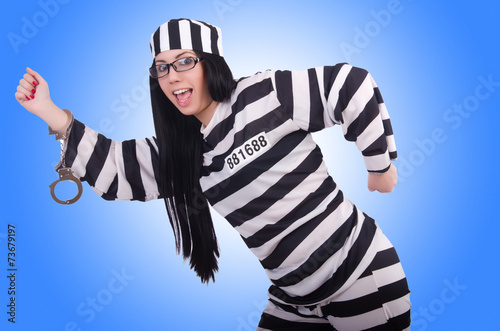 Fototapeta Prisoner in striped uniform on white
