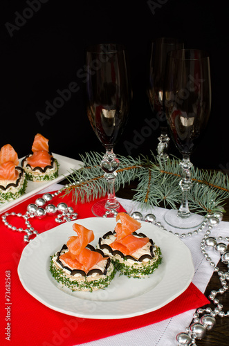 Sandwich with cream cheese and salmon on the holiday table