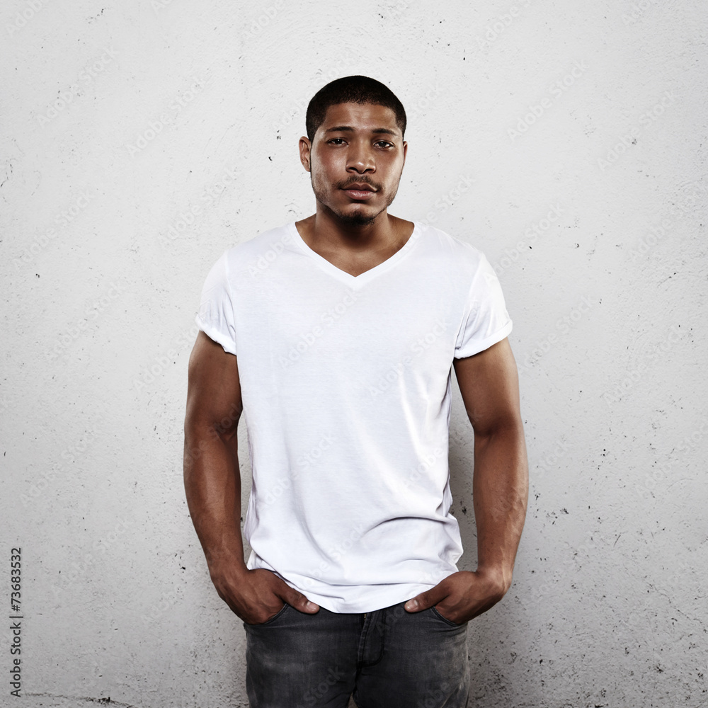 Young man wearing white blank t-shirt Young man wearing white blank t-shirt