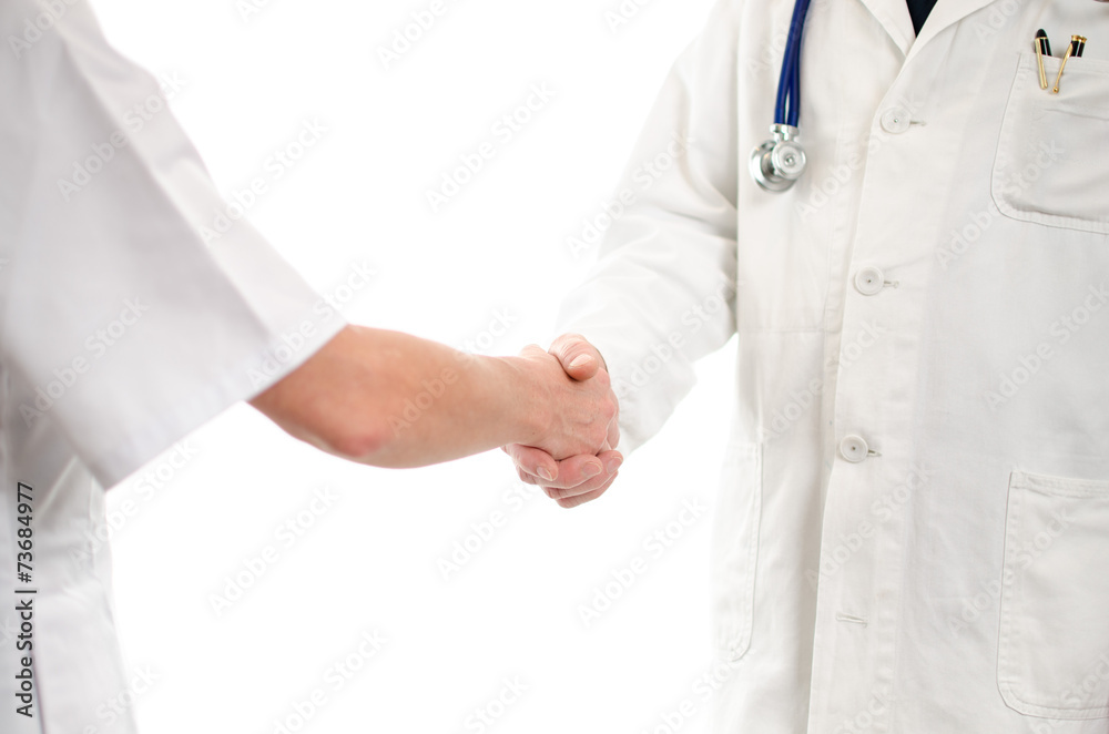 Doctor and nurse shaking hands Doctor and nurse shaking hands