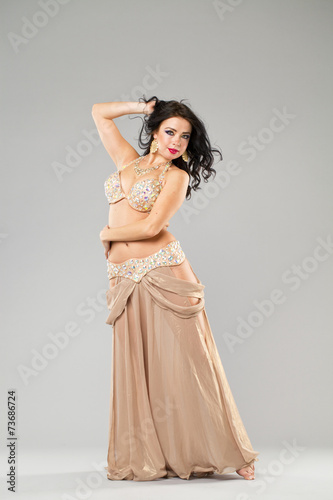 Portrait of the young sexy woman in long arabic skirt