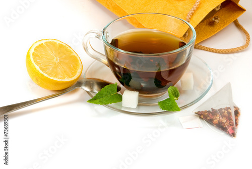 cup of tea and mint on a white background