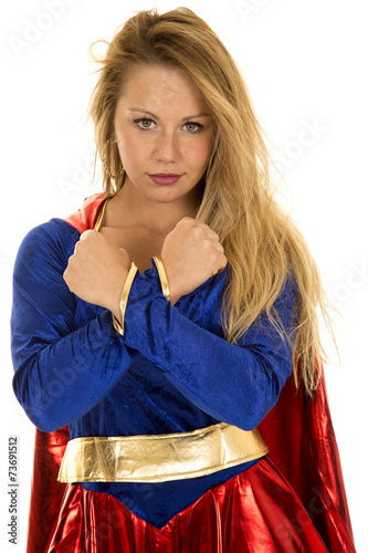 woman super hero cape arms crossed