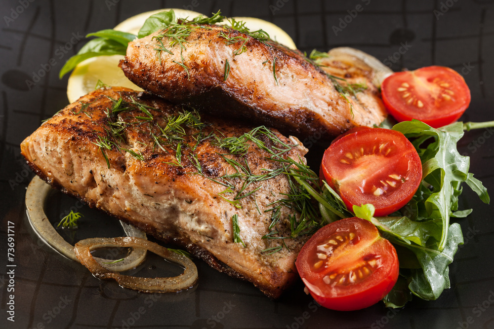 Fried salmon steak with vegetables Fried salmon steak with vegetables