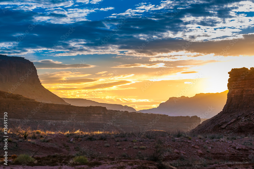 Beautiful Sunset over Dry White Canyon leading To Lake Powell