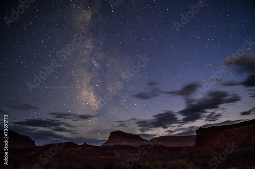 Bright Starry night with a Milky Way over the canyon