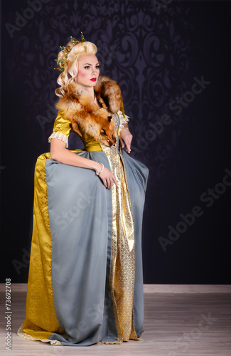 Picture of beautiful haughty queen in royal dress