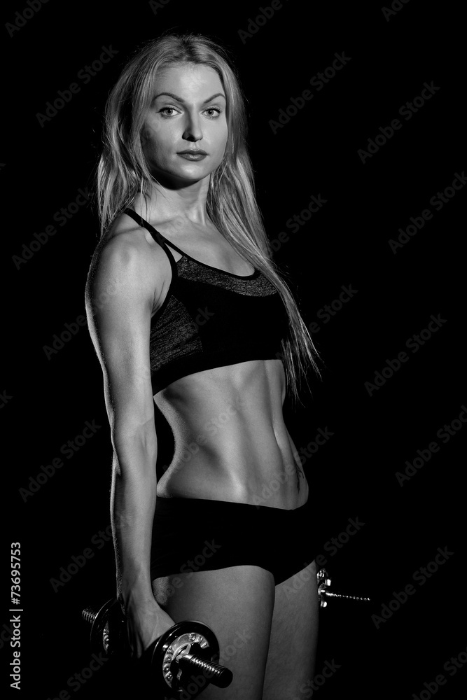 female with dumbbells