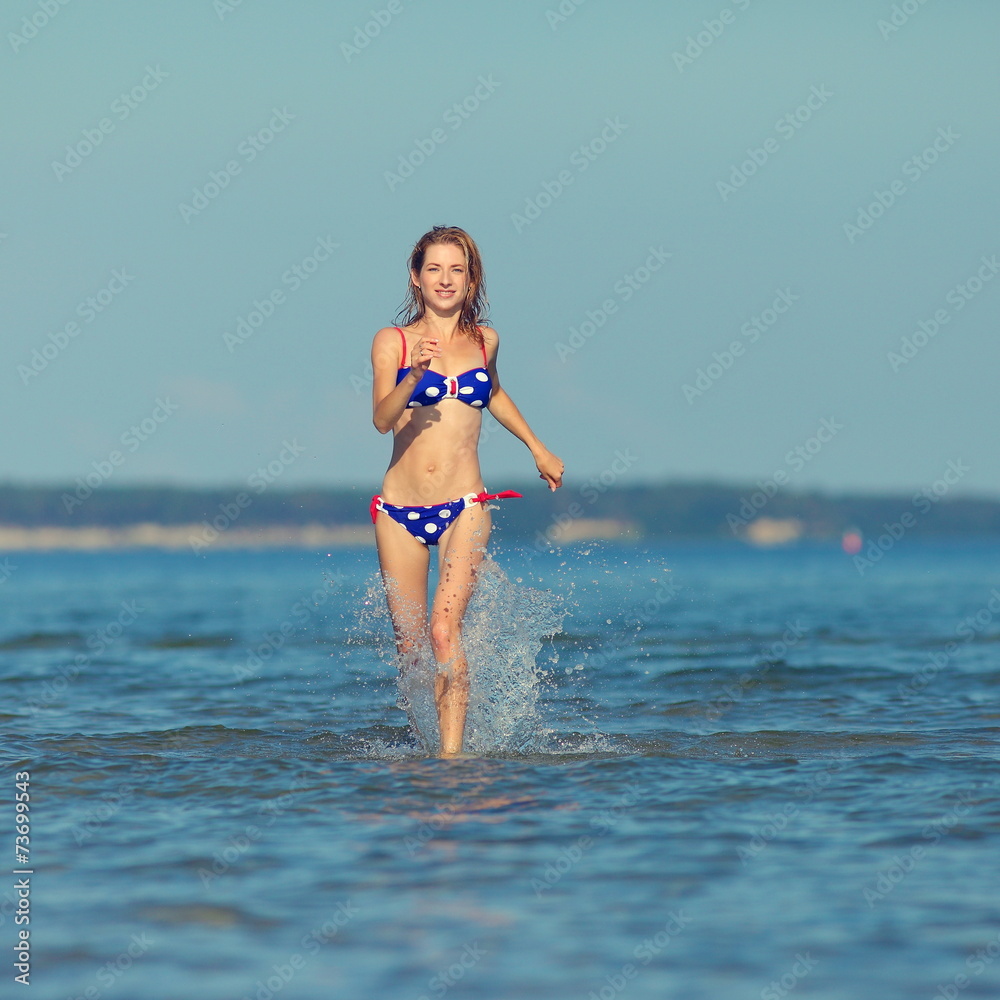woman running in the water