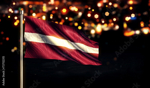Latvia National Flag City Light Night Bokeh Background 3D photo