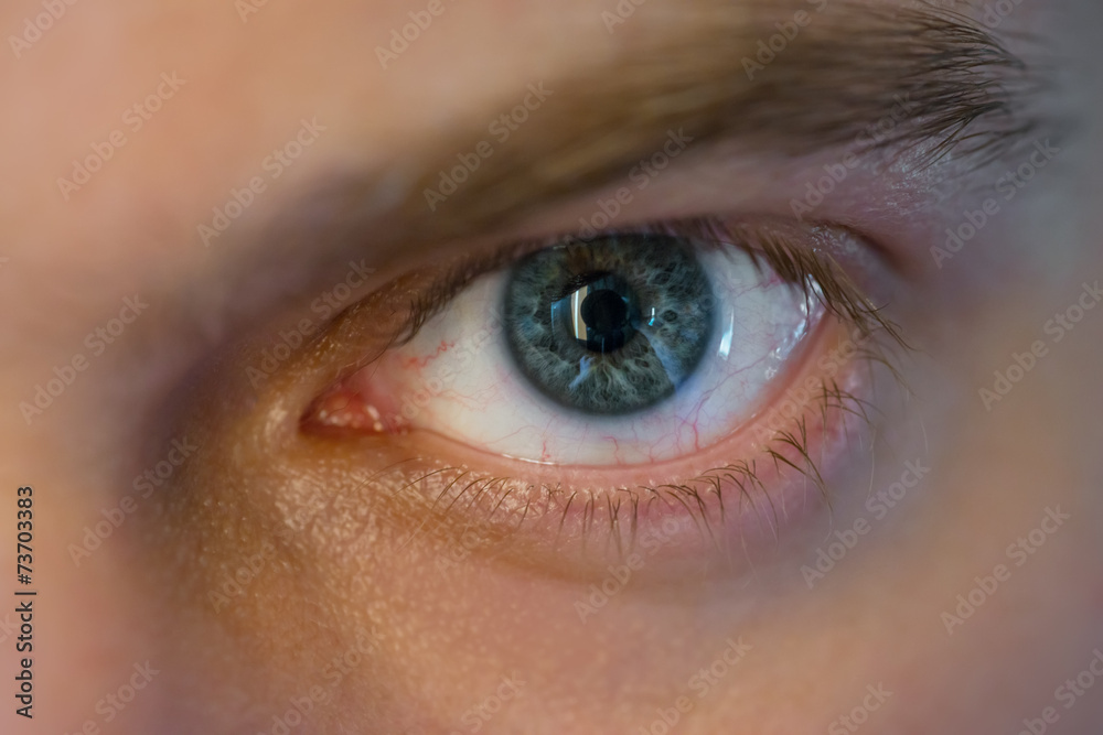 Blue man eye, macro shot. Shallow depth of field. Blue man eye, macro shot. Shallow depth of field.