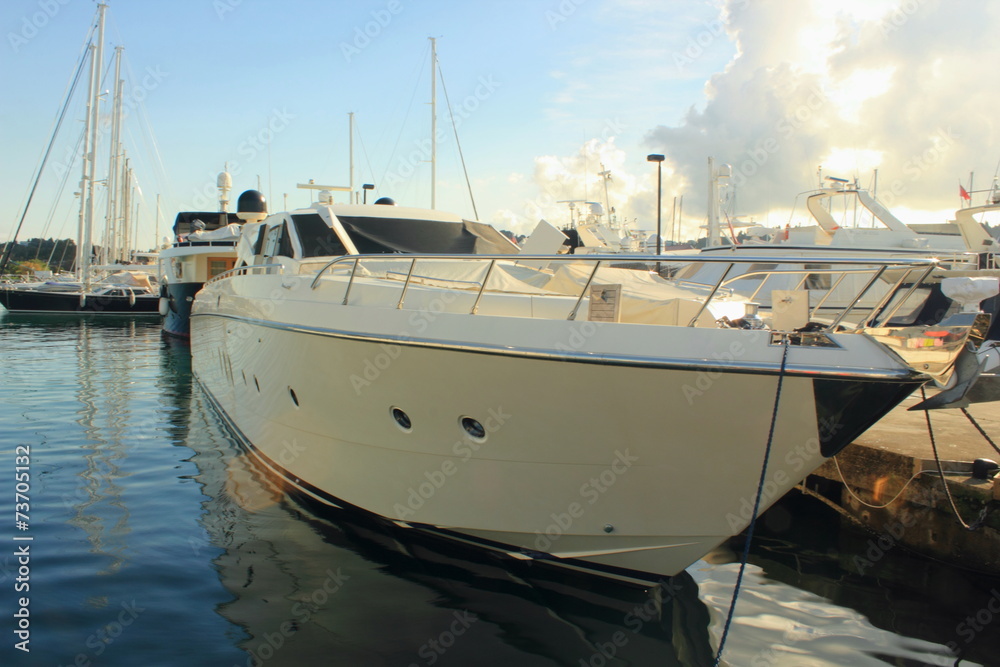 High performance power motor boat in marina High performance power motor boat in marina